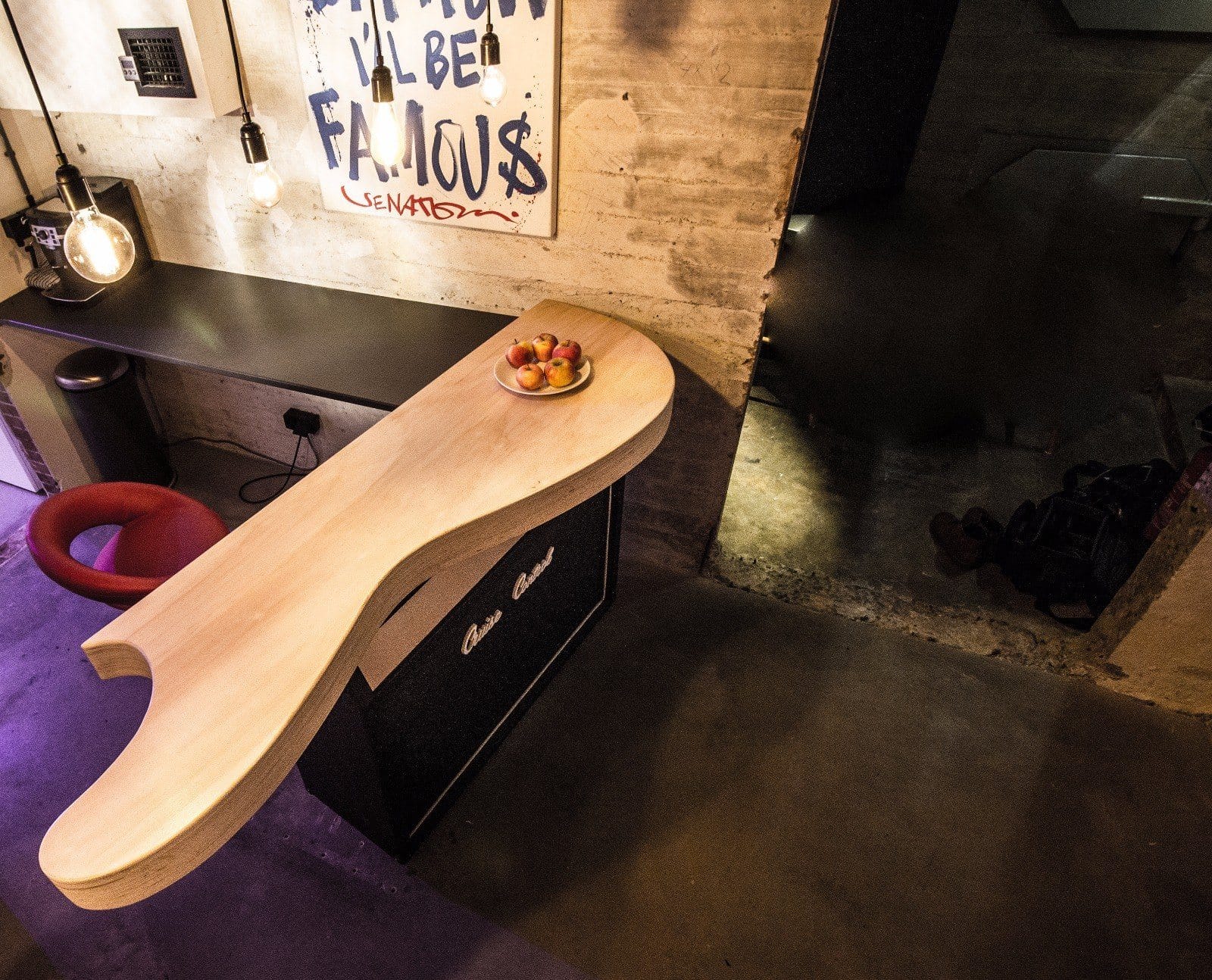 Top view of a custom plywood table built over an amplifier cabinet in the Cruise Control studio